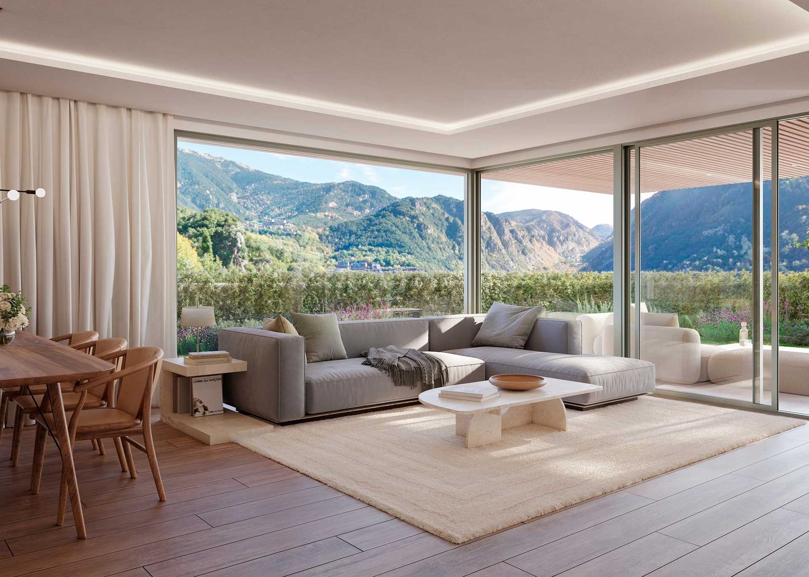 Salón con ventanales y vistas a la montaña