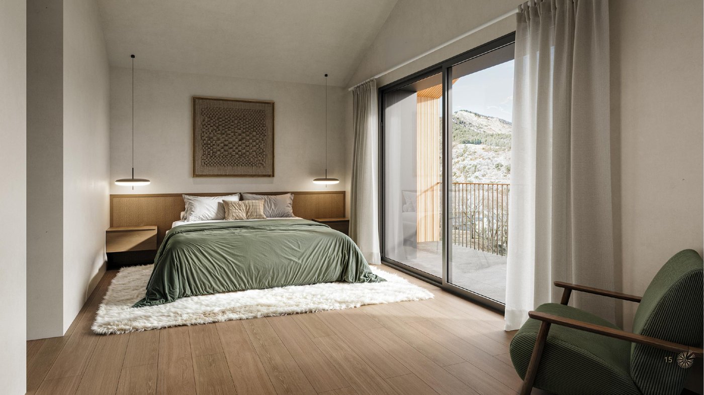 Dormitorio con balcón y vistas a la montaña